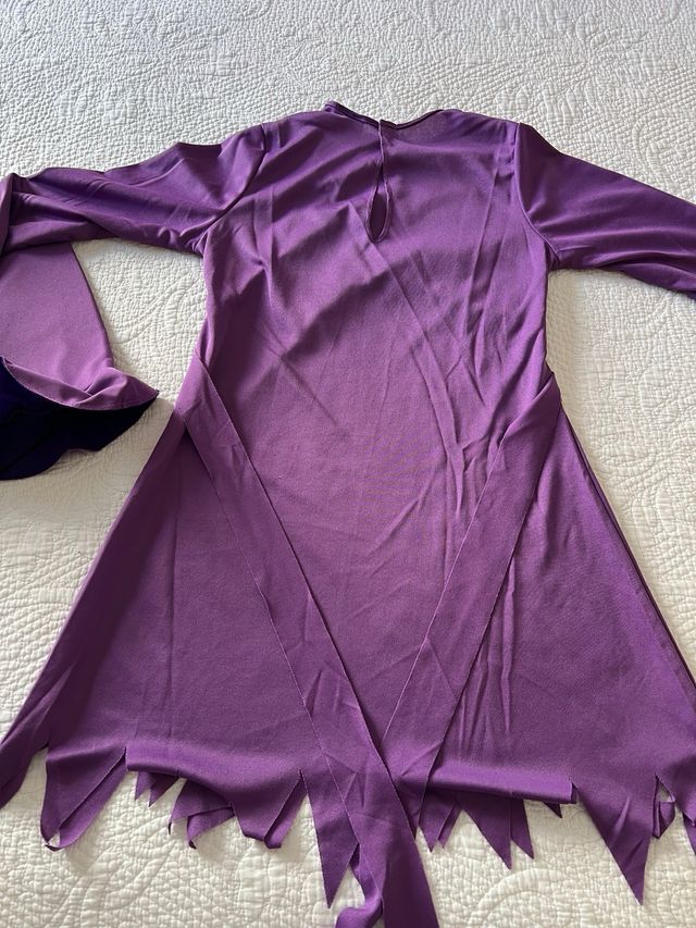 Disfraz de brujo o bruja.