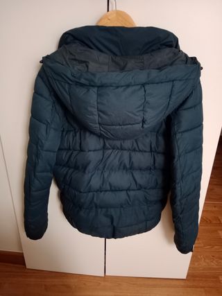 Plumífero azul hombre