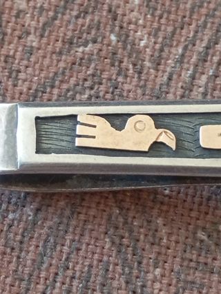 Cilp de billetes de oro y plata