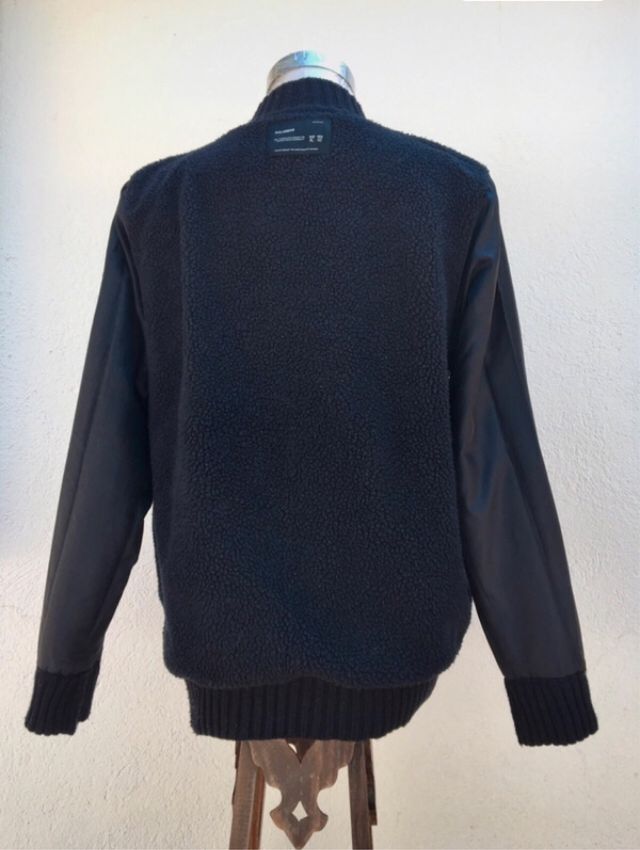 Chaqueta forrada con cremallera y botones