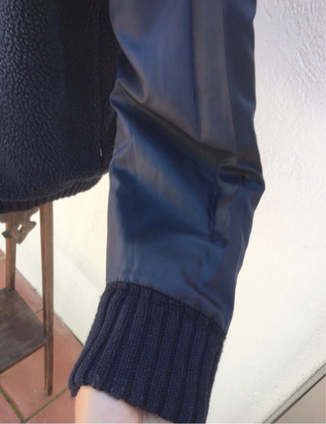 Chaqueta forrada con cremallera y botones