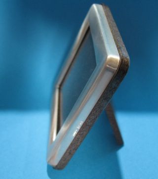 Mini Cornice con la più piccola moneta d'oro