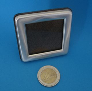 Mini Cornice con la più piccola moneta d'oro