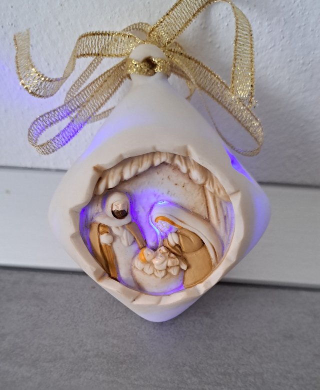 Presepe con luci colorate da appendere