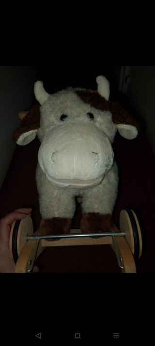 Vaca mecedora y correpasillos