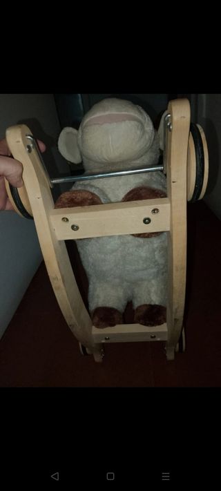 Vaca mecedora y correpasillos