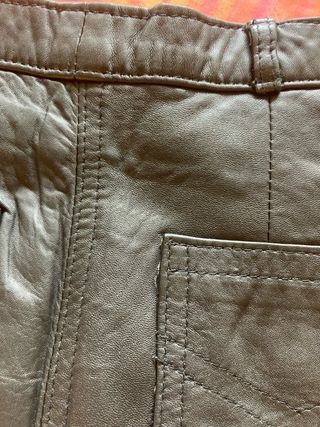 Falda piel negra ( talla 36-38)