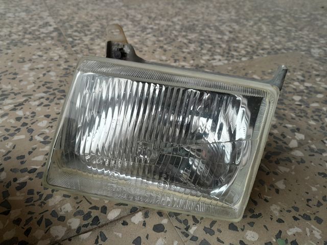 FAROS DELANTEROS FORD ESCORT DEL 84