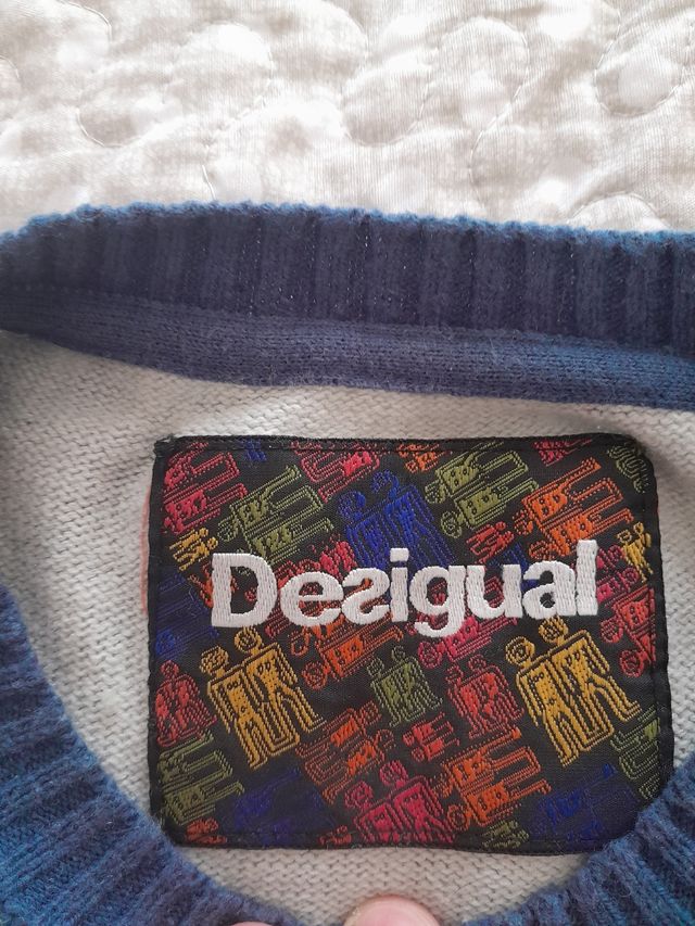Maglione desigual
