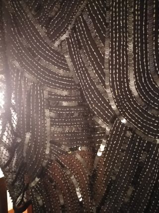 Top nero con payelletes 