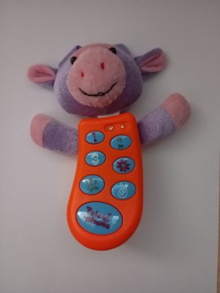 Teléfono juguete muñeco vaca.