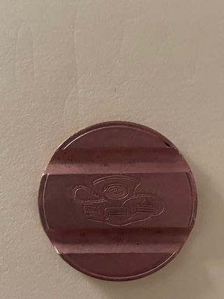 Vecchio gettone telefonico 7509 errore conio