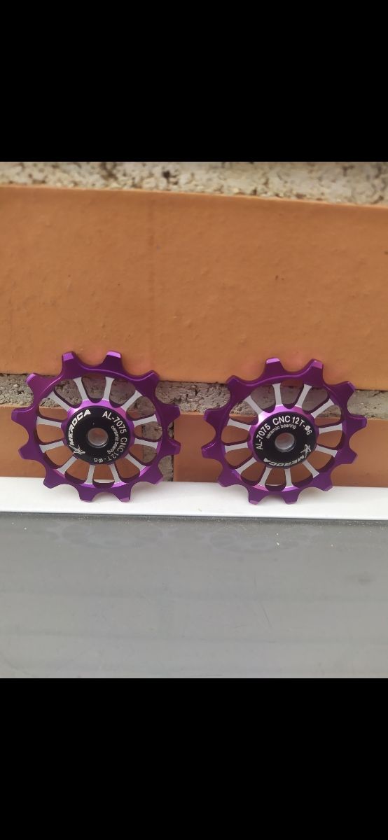 2 Roldanas cerámicas 12T violeta 9-10-11v. 50mm ø.