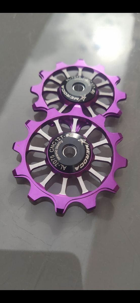 2 Roldanas cerámicas 12T violeta 9-10-11v. 50mm ø.