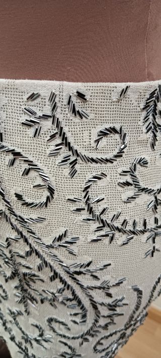 E151- Falda azul pastel con abalorios