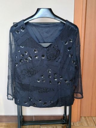 Maglia elegante con maniche trasparenti