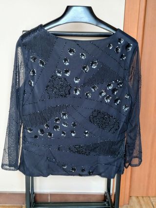 Maglia elegante con maniche trasparenti