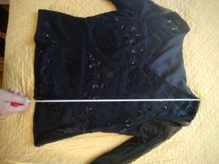 Maglia elegante con maniche trasparenti