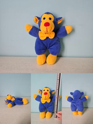 Scimmietta peluche giallo e blu