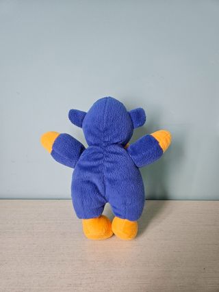 Scimmietta peluche giallo e blu