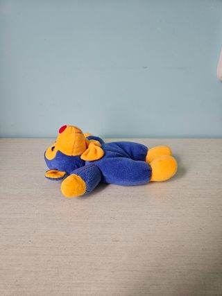 Scimmietta peluche giallo e blu