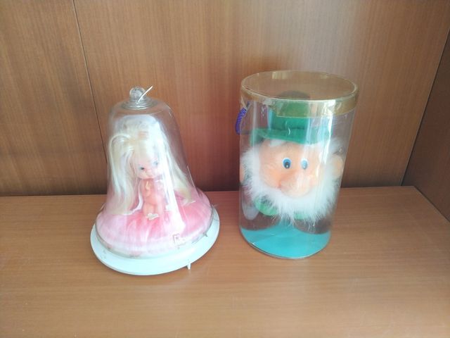 Bambola antica e peluche antico