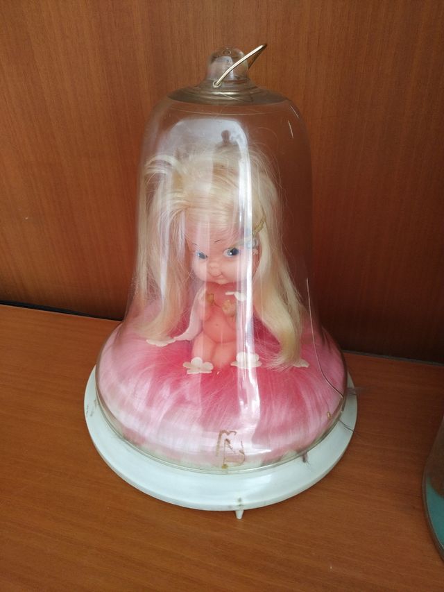 Bambola antica e peluche antico