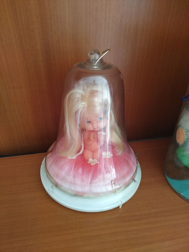 Bambola antica e peluche antico