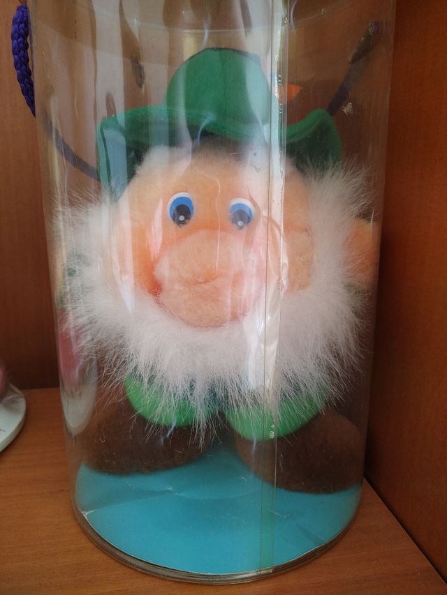 Bambola antica e peluche antico