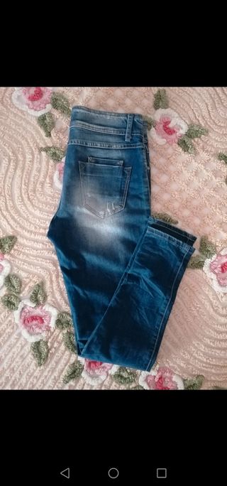 Jeans scuri con cavallo basso