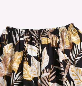 Pantalón de pierna ancha estampado tropical