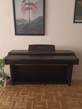 Piano eléctrico de pared