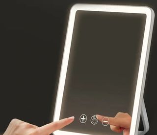 Espejo de maquillaje con luz