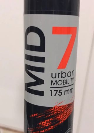 Patinete OXELO MID 7. Naranja y negro.