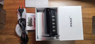 Cargador múltiple con cámara espía