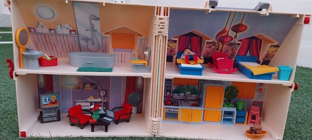 Casa playmobil y tienda de ropa
