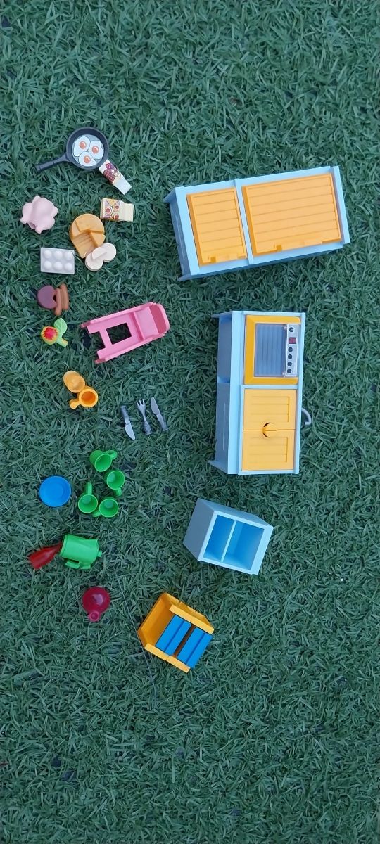 Casa playmobil y tienda de ropa