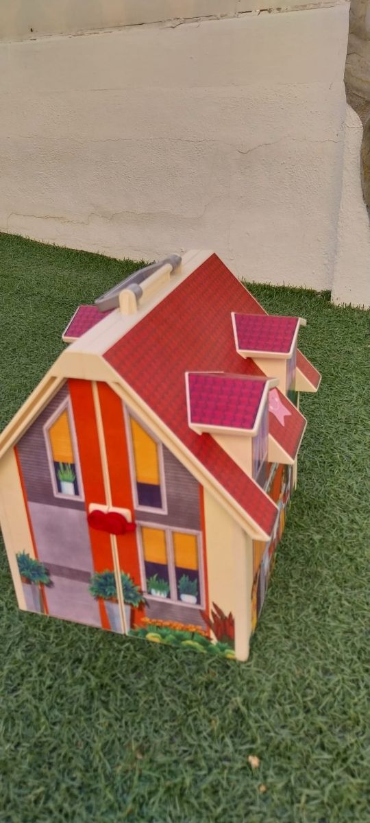 Casa playmobil y tienda de ropa