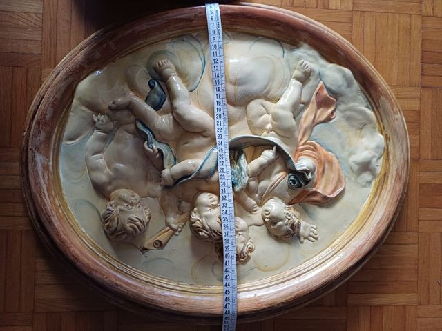 Capezzale ceramica con putti 