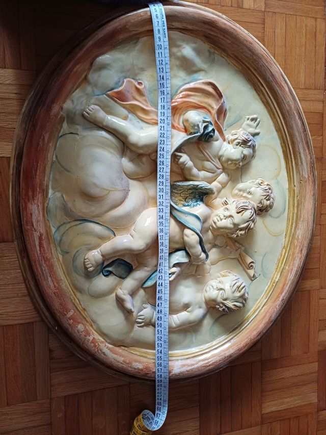 Capezzale ceramica con putti 