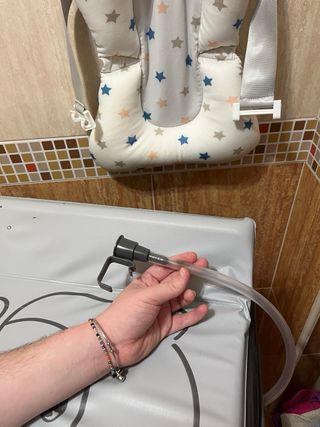 Cambiador de bebé y bañera