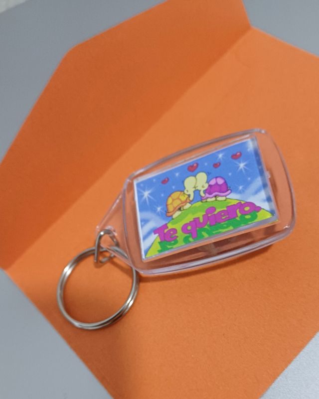 Llavero..  Soy tan feliz... Sobre incluido