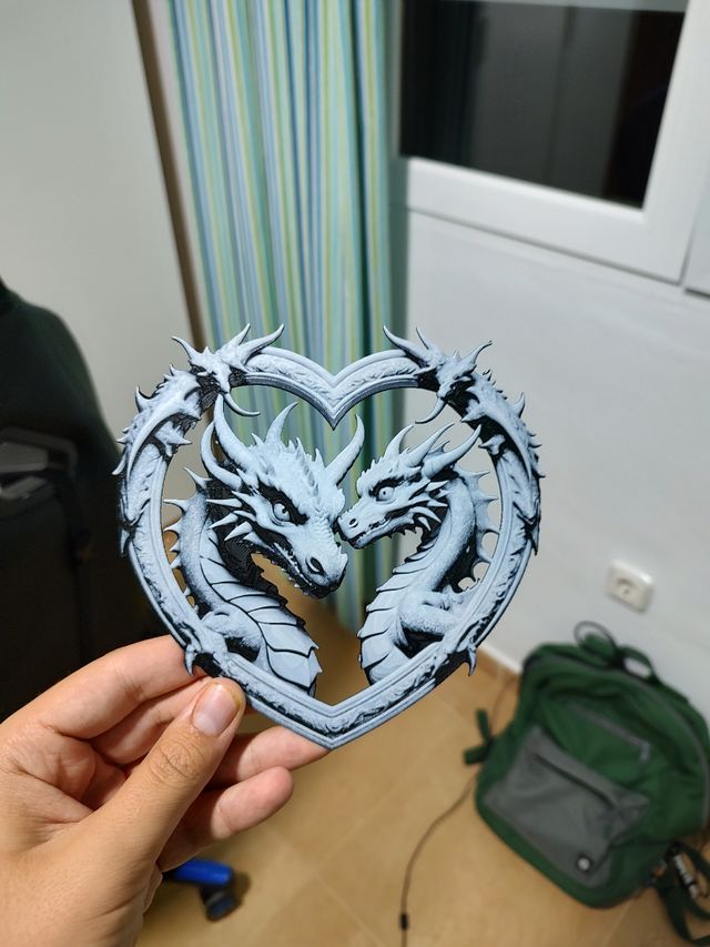 Dragones con forma de corazón