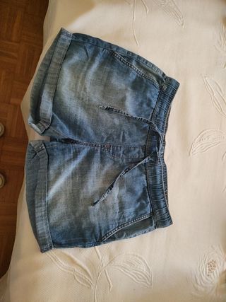 Pantalones vaqueros cortos chica 
