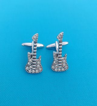 Gemelos guitarra con brillo elegantes