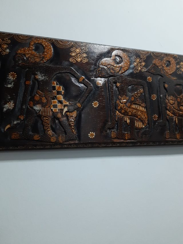 Talla africana madera