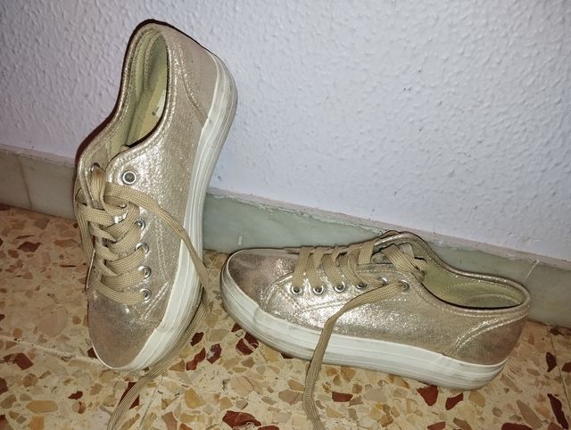 Zapatillas doradas