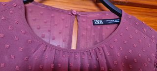 Blusa rosa plumetti de Zara