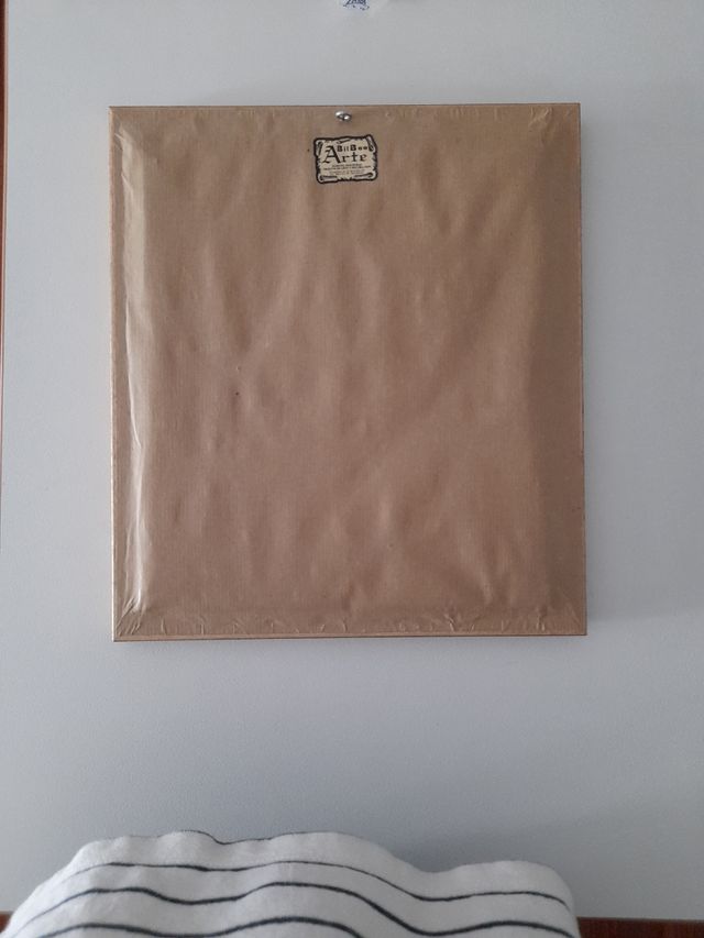 Cuadro seta en punto de cruz