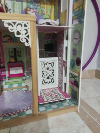 Casa de muñecas de madera